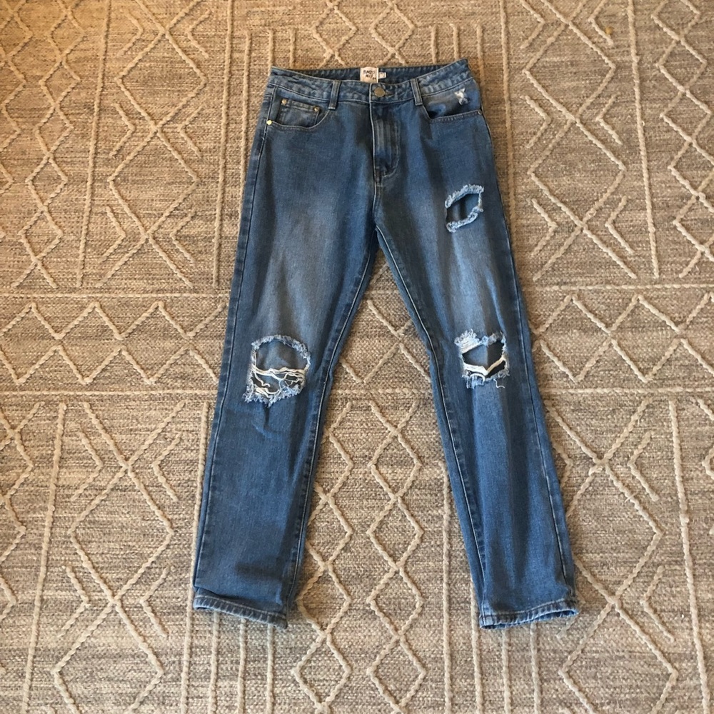 Distressed blue jeans